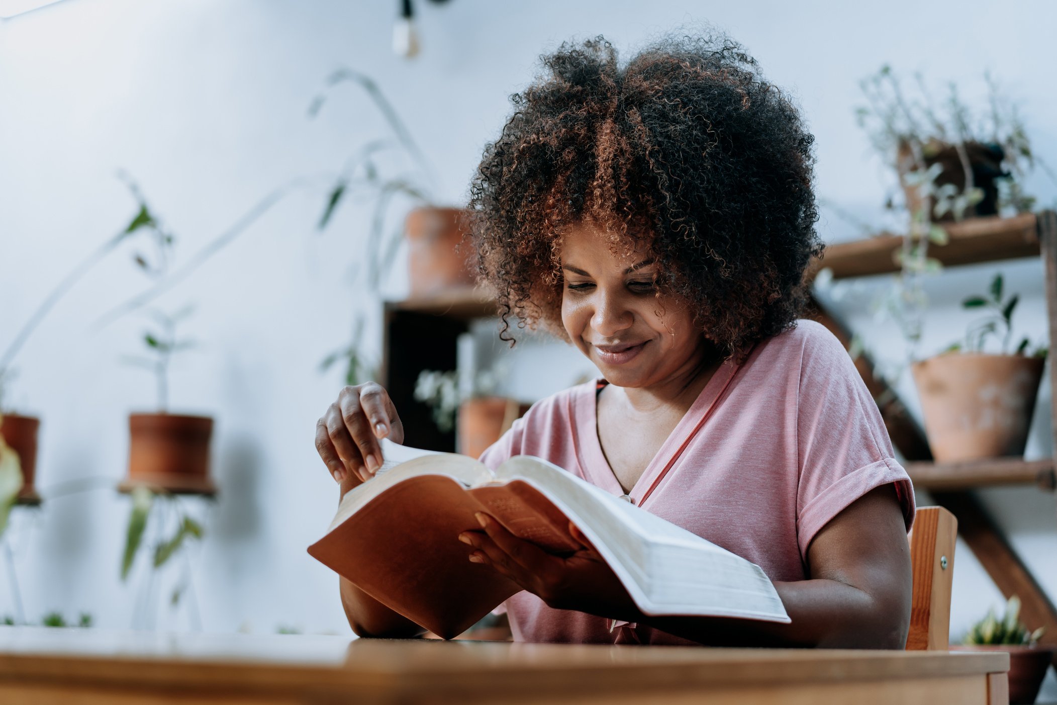 Woman reading the bible